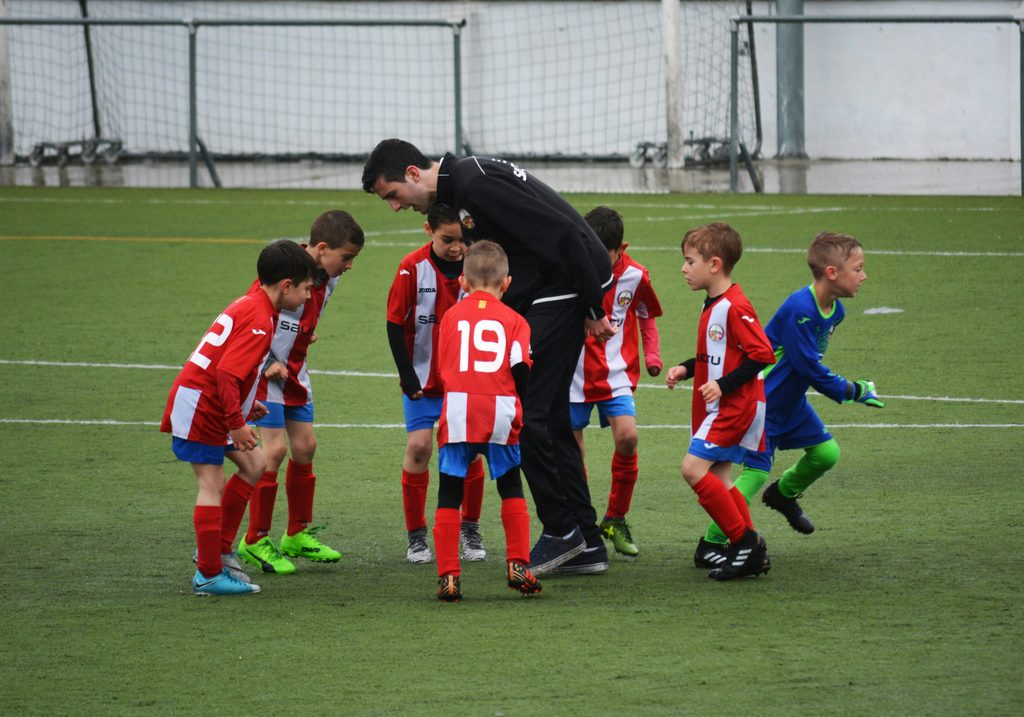 A youth soccer team sporting matching team gear.